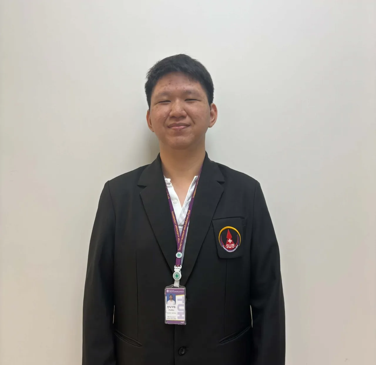 นายคุณากร กางทอง